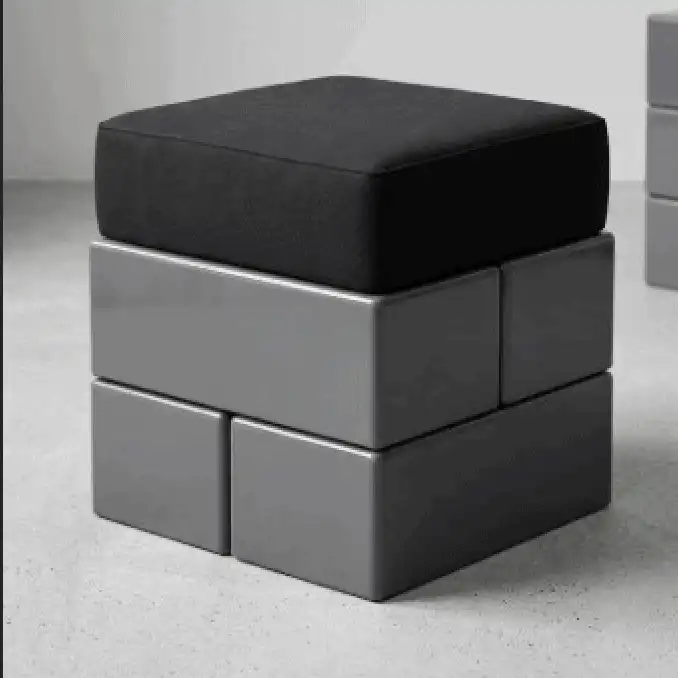 PrixxOne : tabouret composé de modules gris avec un coussin noir.